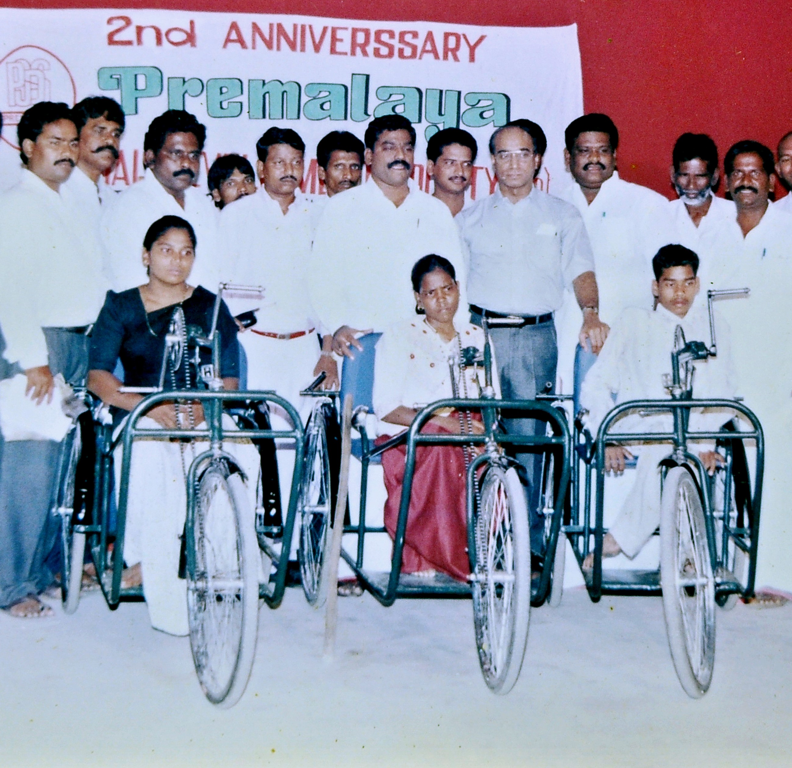 Wheelchair distribution at the Premalaya second anniversary