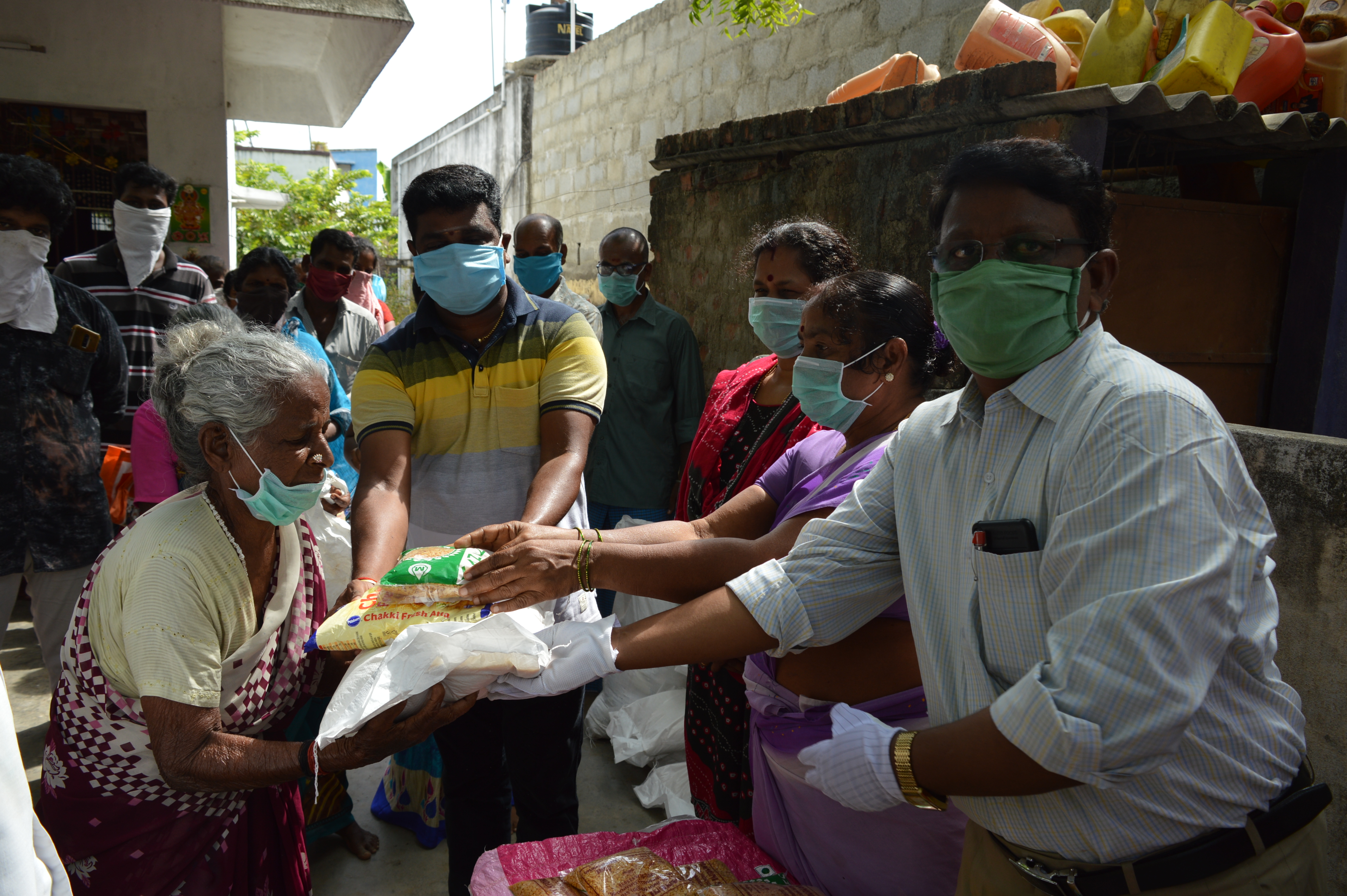 Handing out food supplies to families