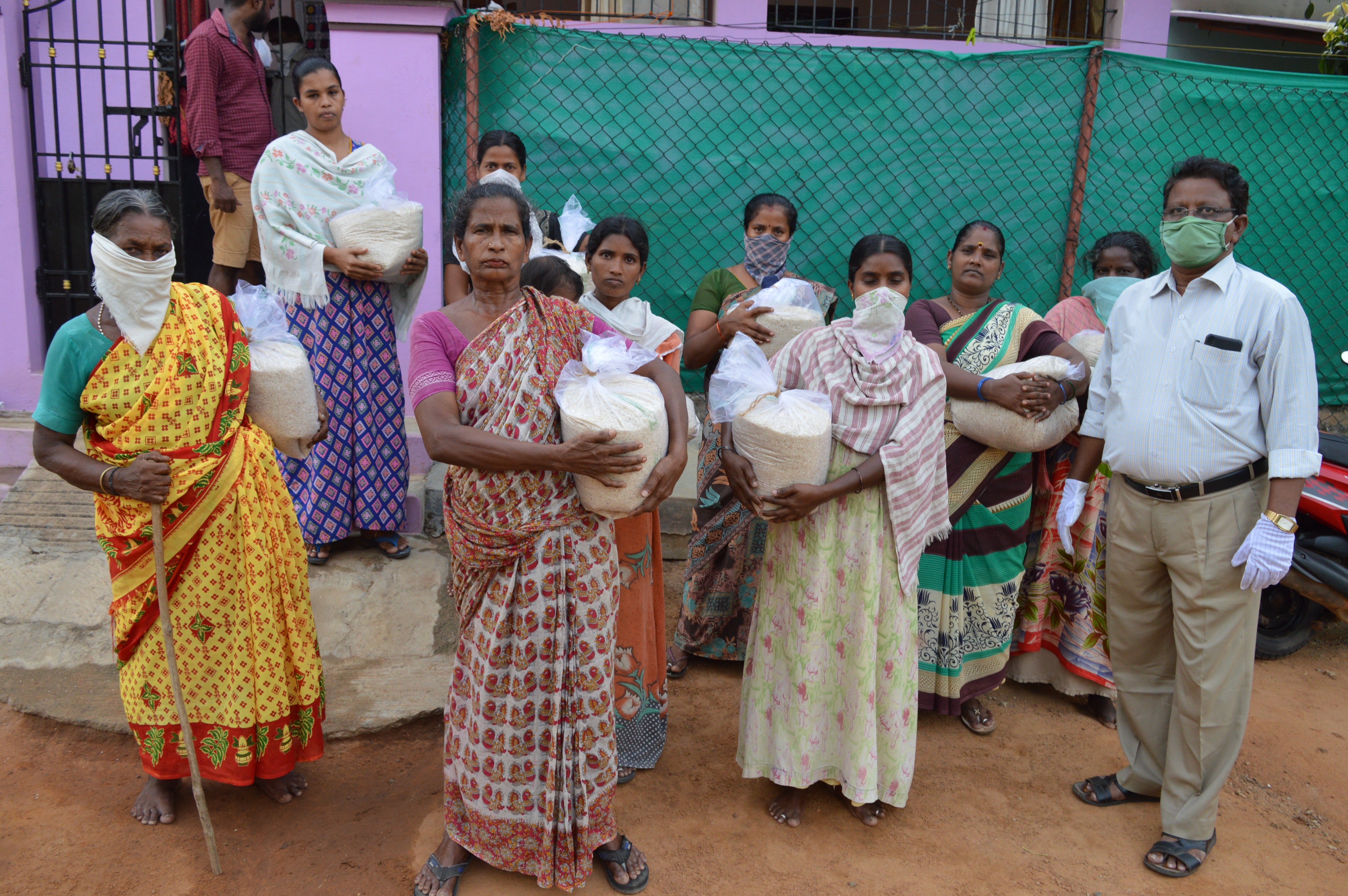Women receiving relief supplies